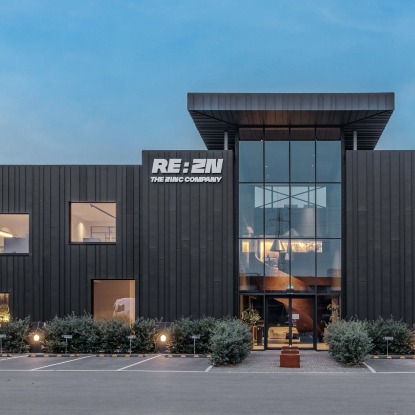 REAZN Belgium production plant with REAZN+ sign, the largest producing company in the REAZN GROUP with 110,000 t yearly zinc alloy production capacity