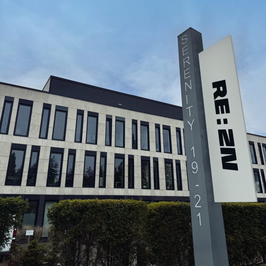 REAZN Luxembourg headquarters building with company signage, serving as the main interface for REAZN GROUP products and services