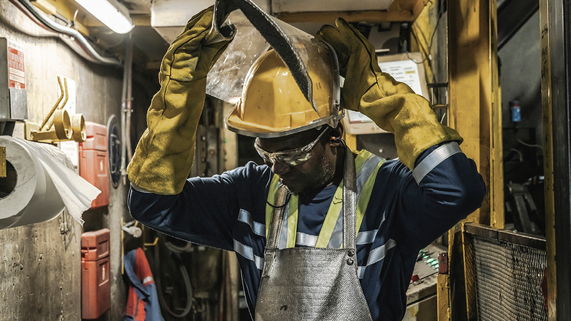 REAZN production employee wearing full protective equipment, ensuring safety standards during zinc recycling operations